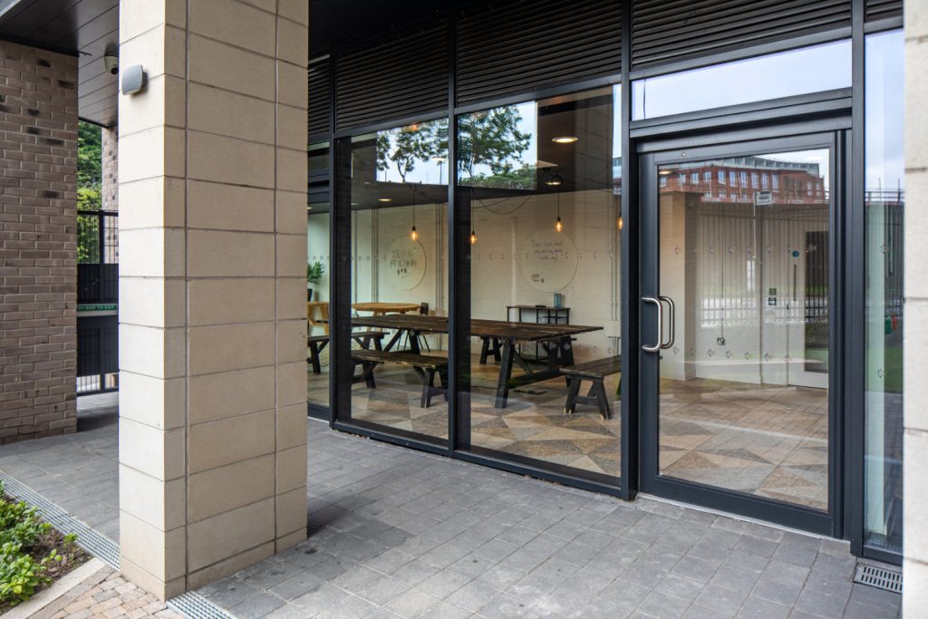 Seniors Robust SPW600 aluminium doors installed at True Student Accommodation in Glasgow.